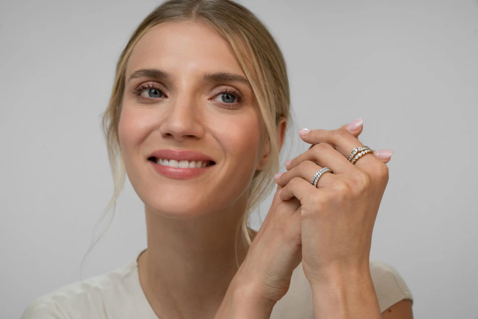 woman wearing engagement ring alternatives