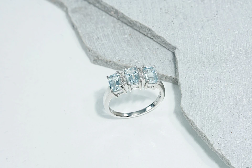 three stone aquamarine ring