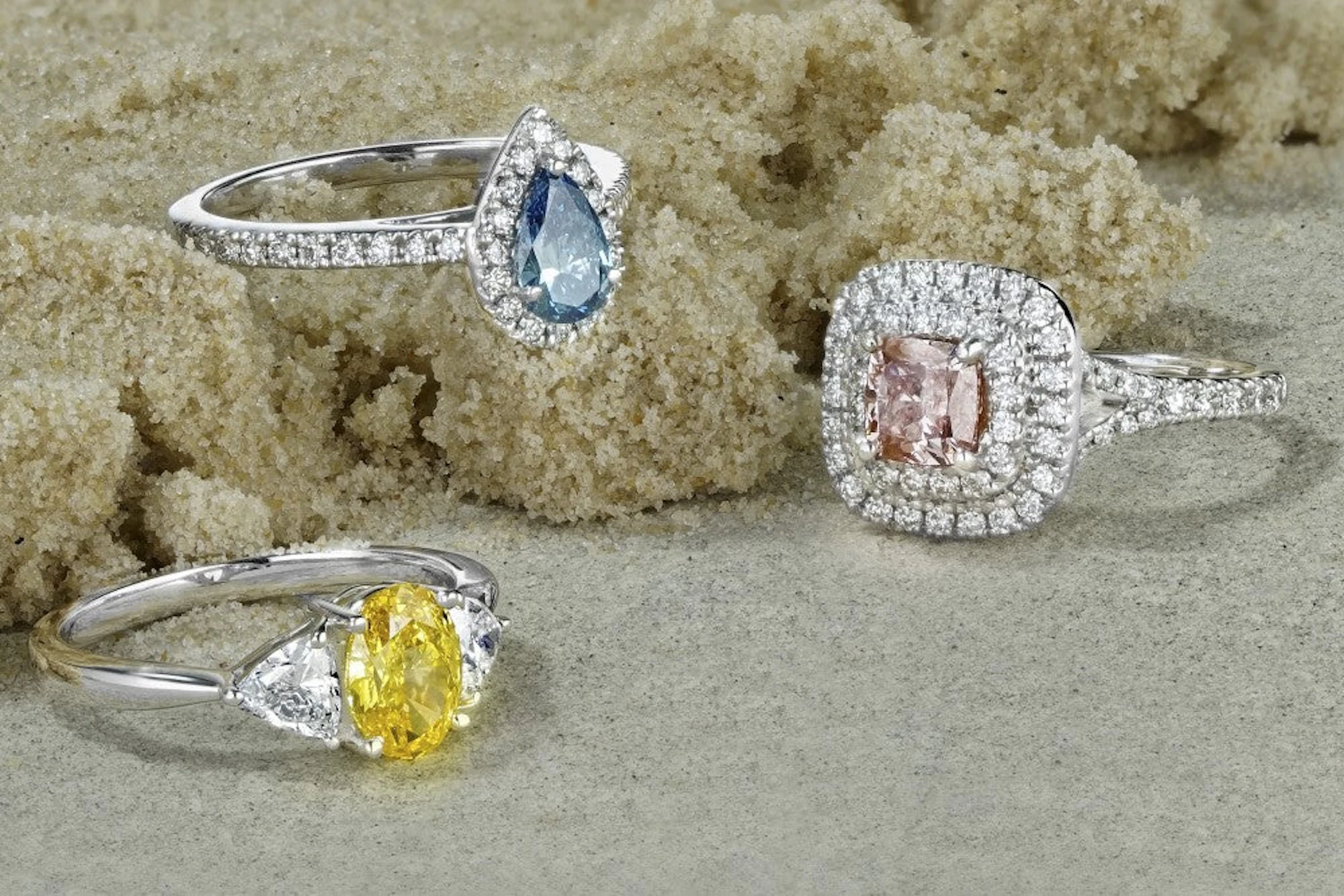 pink, yellow and blue lab diamond rings