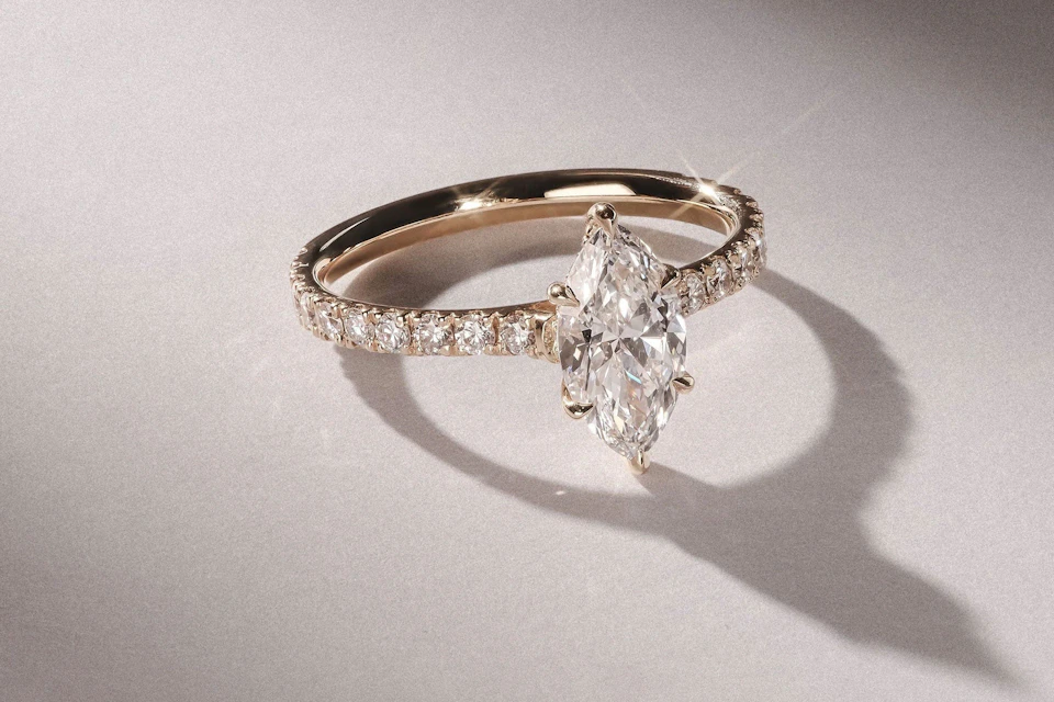 marquise cut diamond sidestones gold engagement ring