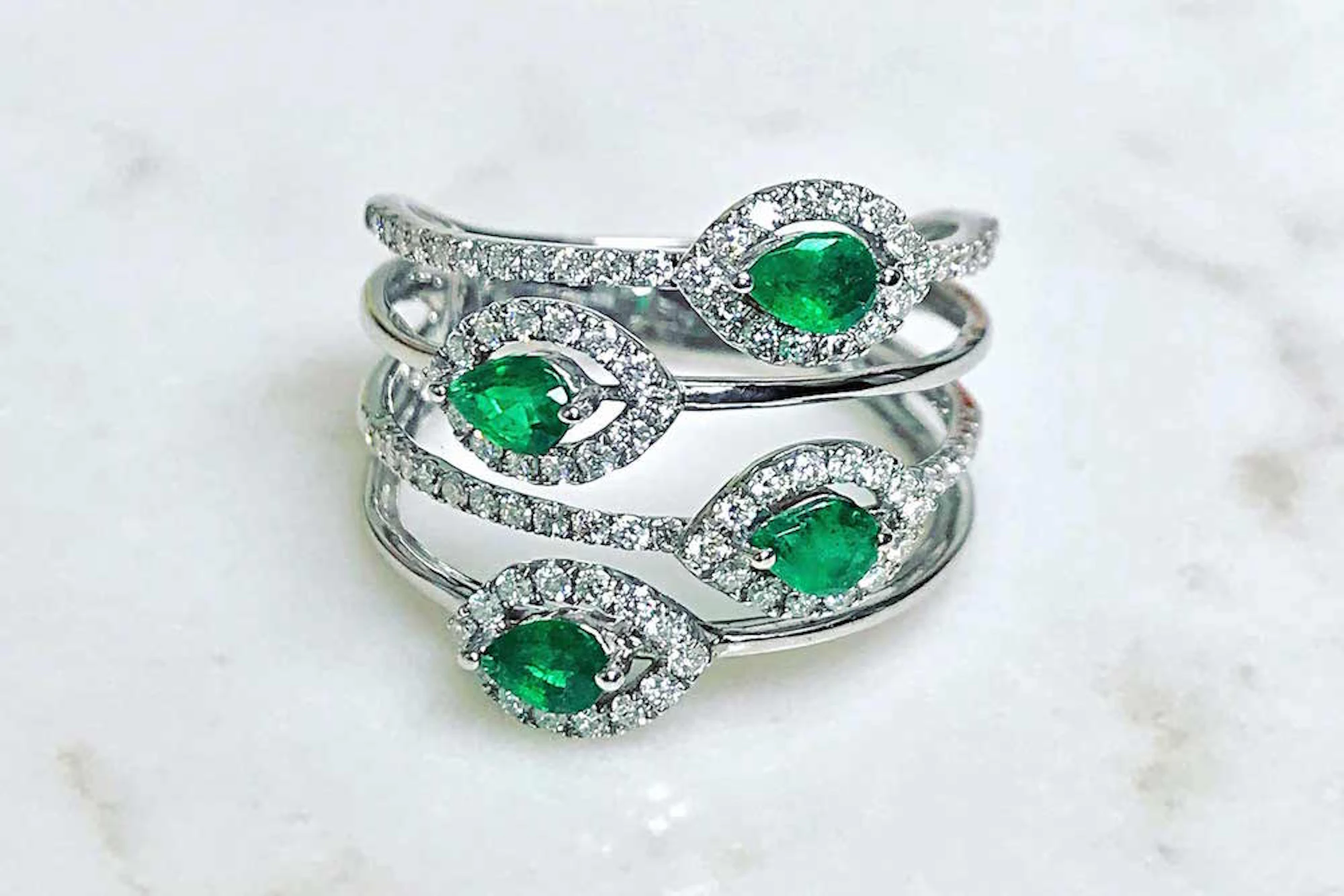 emerald and lab diamond halo statement ring
