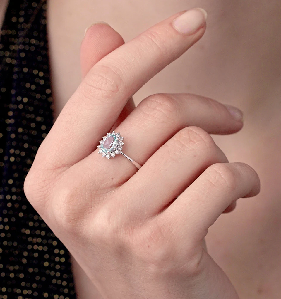 Blue Topaz 0.95CT And Diamond 9K White Gold Ring