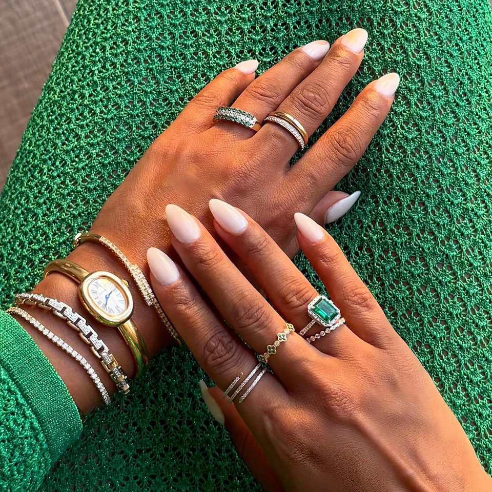 Emerald and Diamond Triple Row Asteria Eternity Ring in 18K Gold