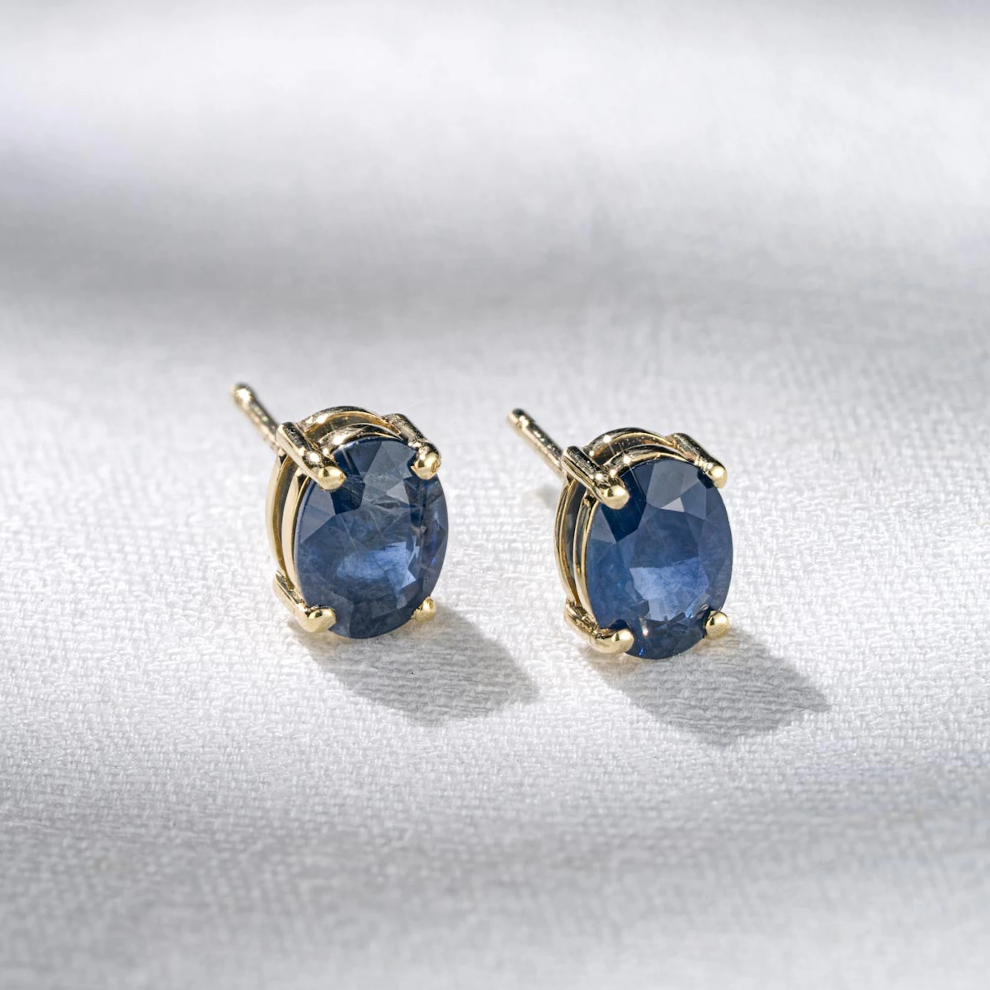 Sapphire 7mm x 5mm 9K Yellow Gold Earrings