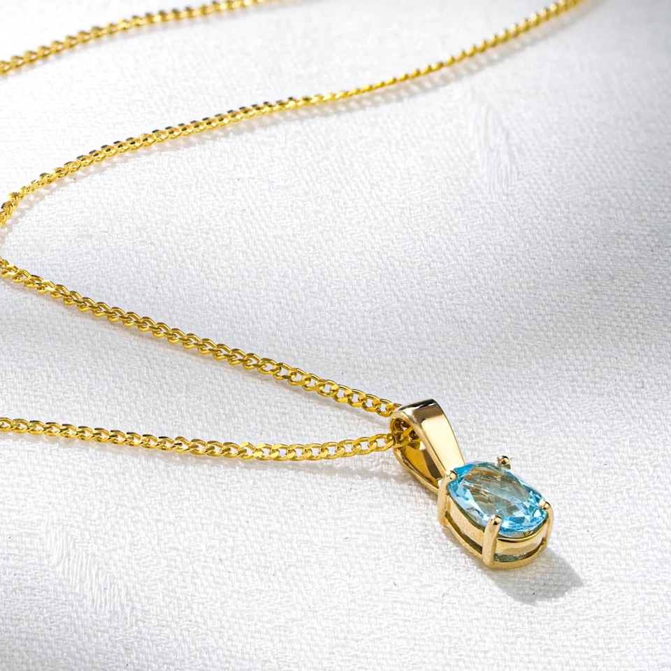 Blue Topaz 7 x 5mm 9K Yellow Gold Pendant Necklace
