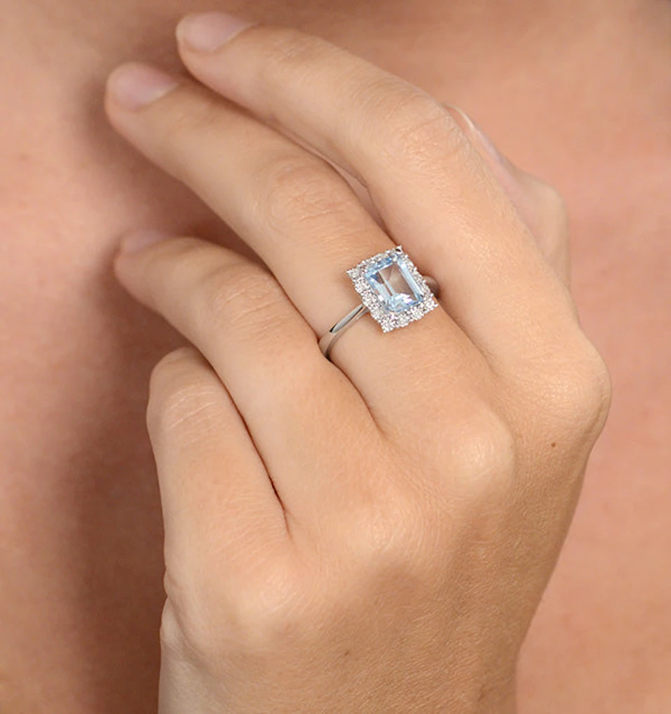 Blue Topaz 8 x 6mm and Diamond 9K White Gold Ring
