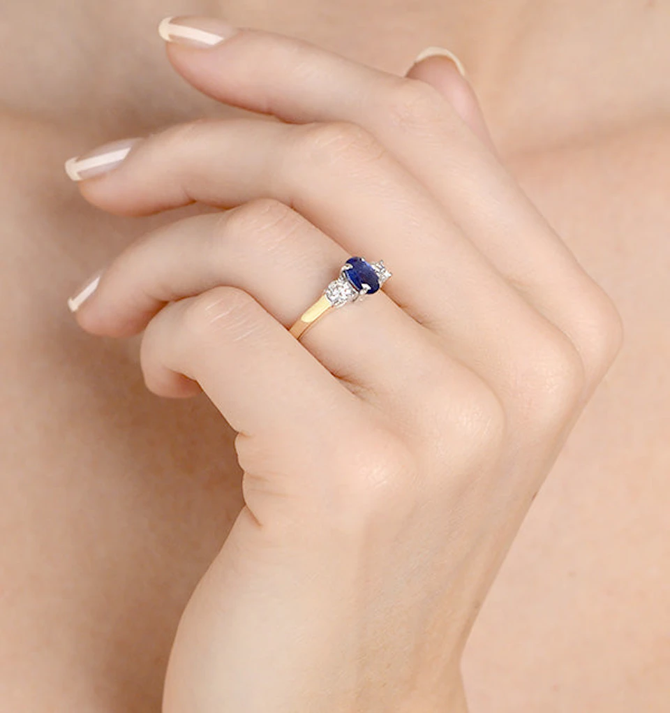 0.50ct Oval Cut Sapphire and Lab Diamond 3 Stone Ring in 9K Yellow Gold