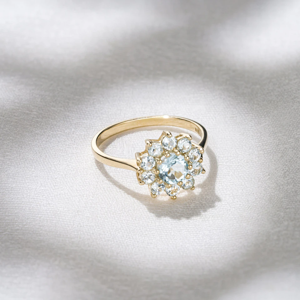 1.10ct Blue Topaz Cluster Ring in 9K Yellow Gold