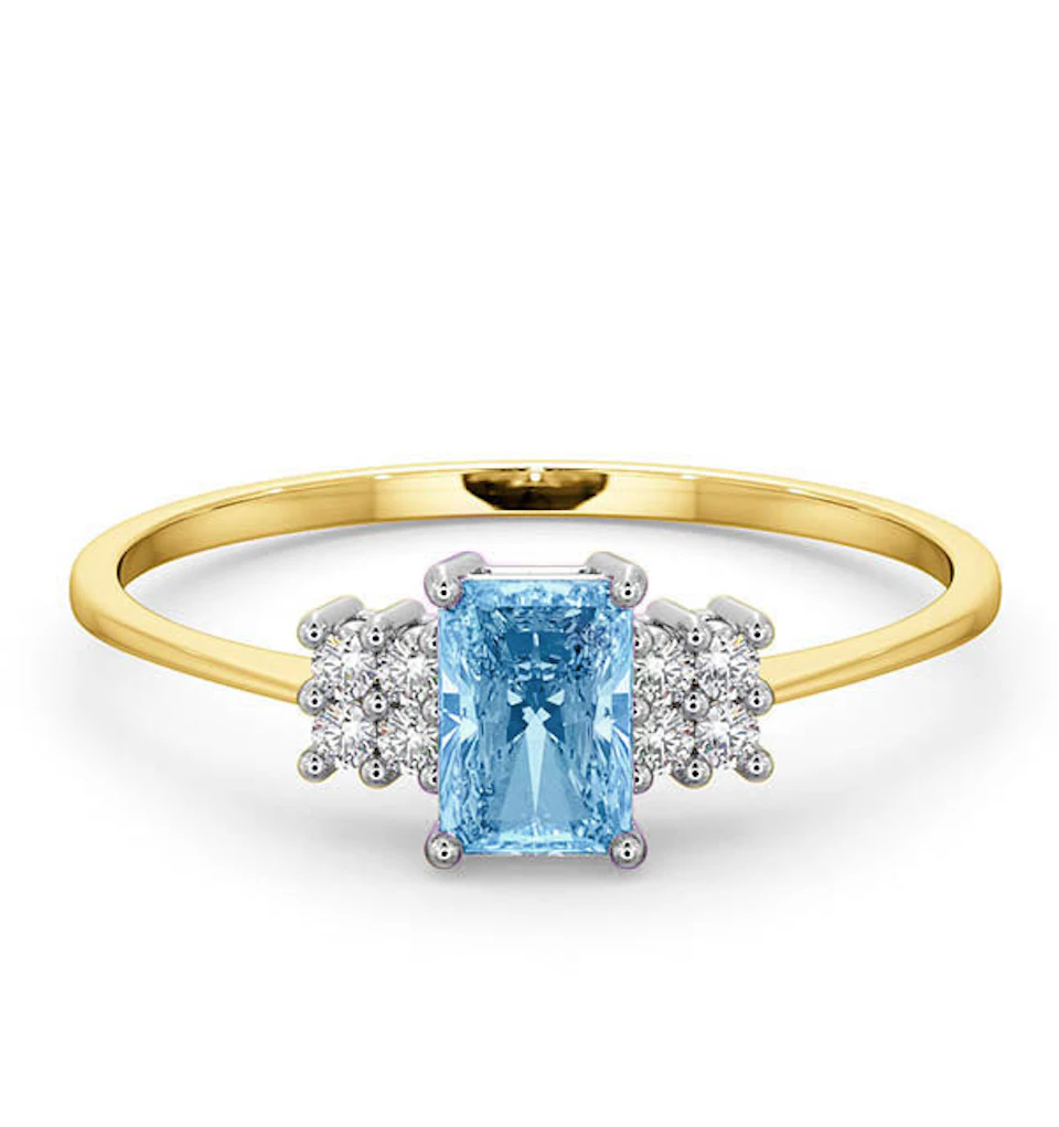Blue Topaz 6 x 4mm And Diamond Ring 9K Yellow Gold