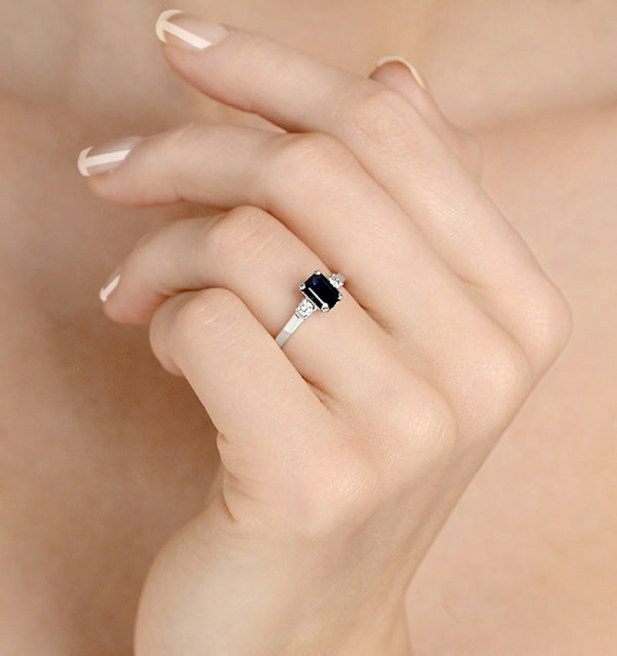 Sapphire 7 x 5mm And Diamond 18K White Gold Ring