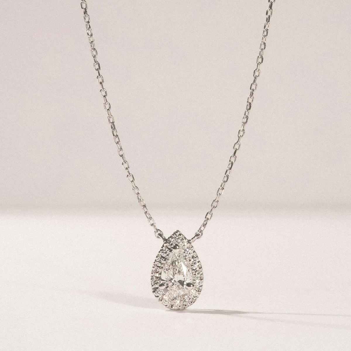 Masami Diamond Pear Halo Necklace 0.10ct Pave Set in 9K White Gold