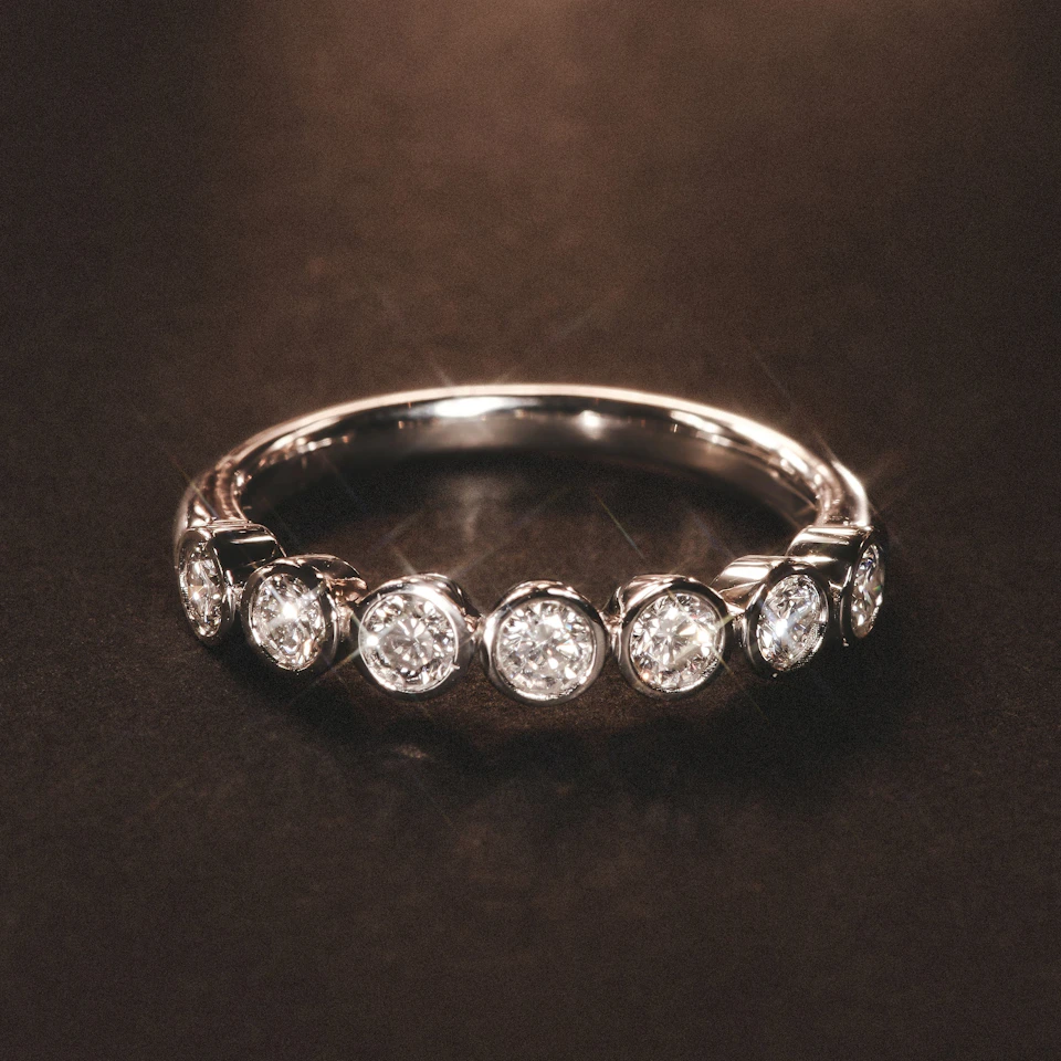 Orbit Half Band 0.30ct F/VS Round Cut Rubover Eternity Ring in 18K Silver