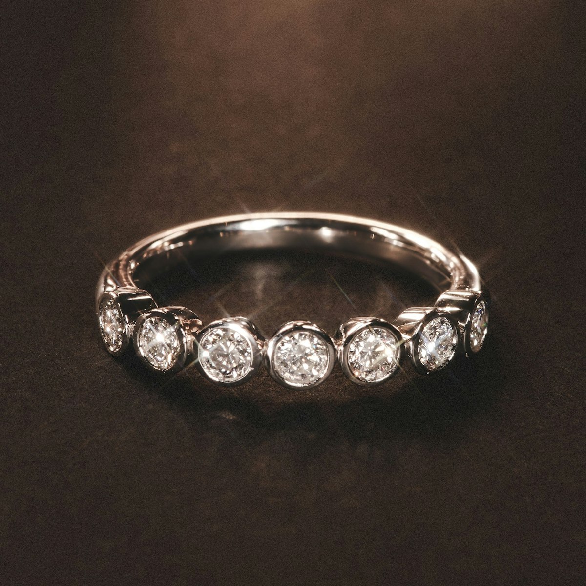 Orbit Half Band 0.30ct F/VS Round Cut Rubover Eternity Ring in 9K White Gold