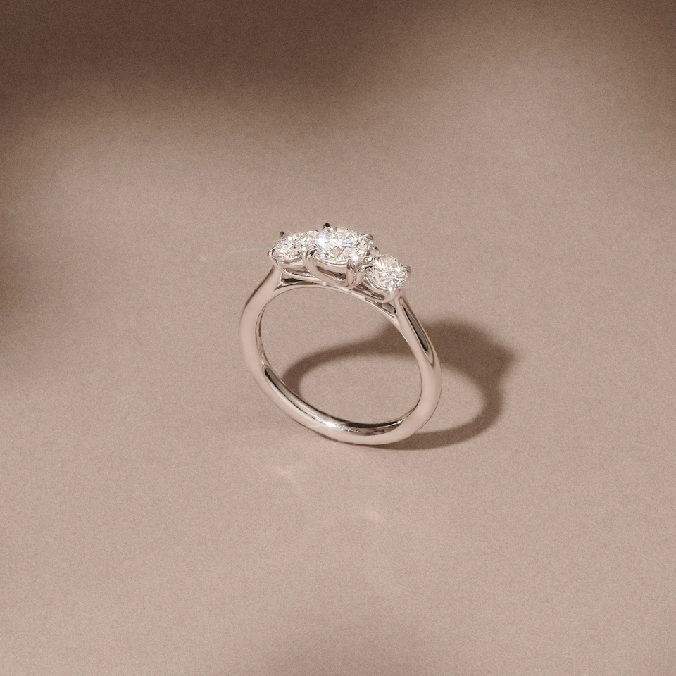 Evoke 1.00ct Round Cut Lab Diamond 3 Stone Ring in 9K White Gold