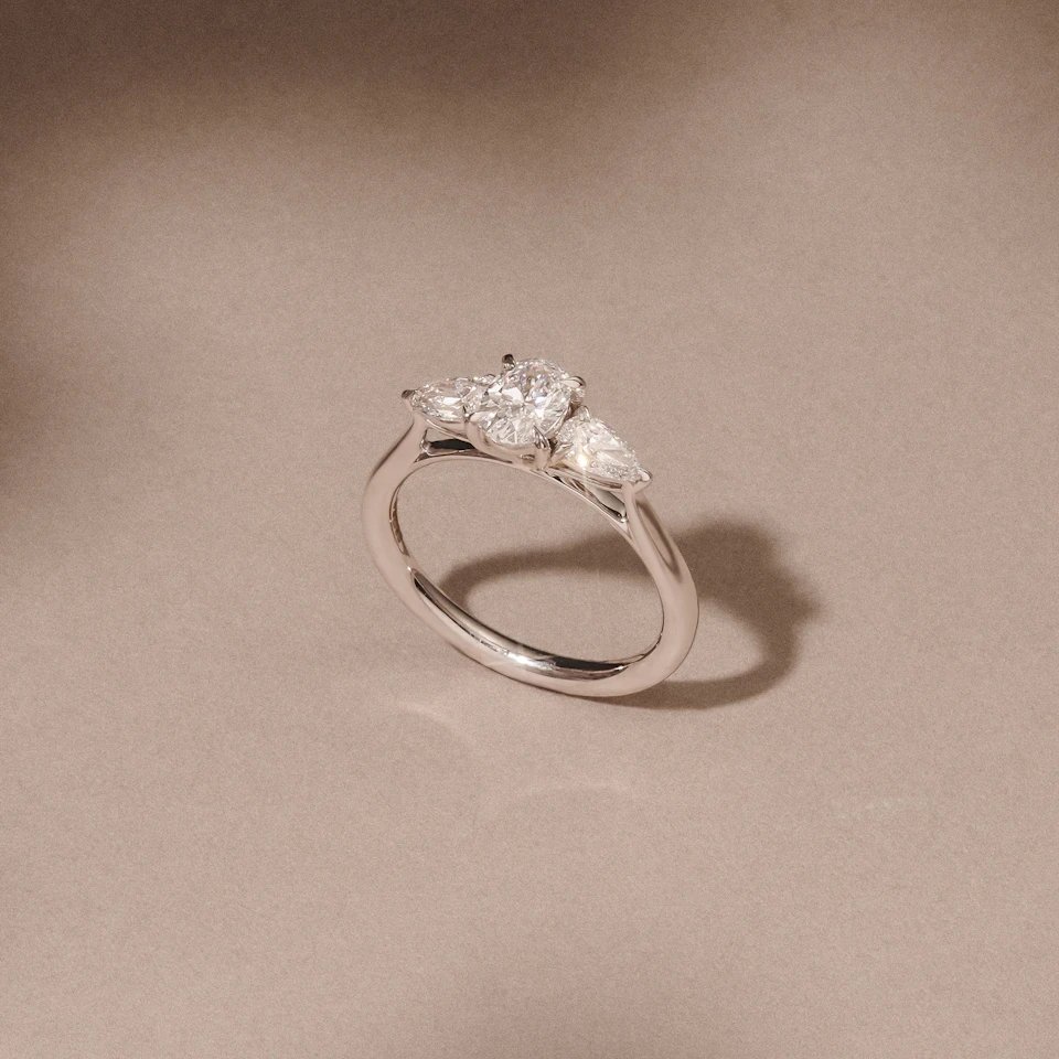 Evoke 1.00ct Oval Cut Lab Diamond 3 Stone Ring in 9K White Gold