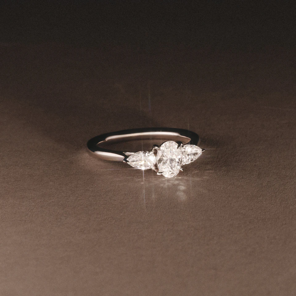 Evoke 1.00ct Oval Cut Lab Diamond 3 Stone Ring in 9K White Gold