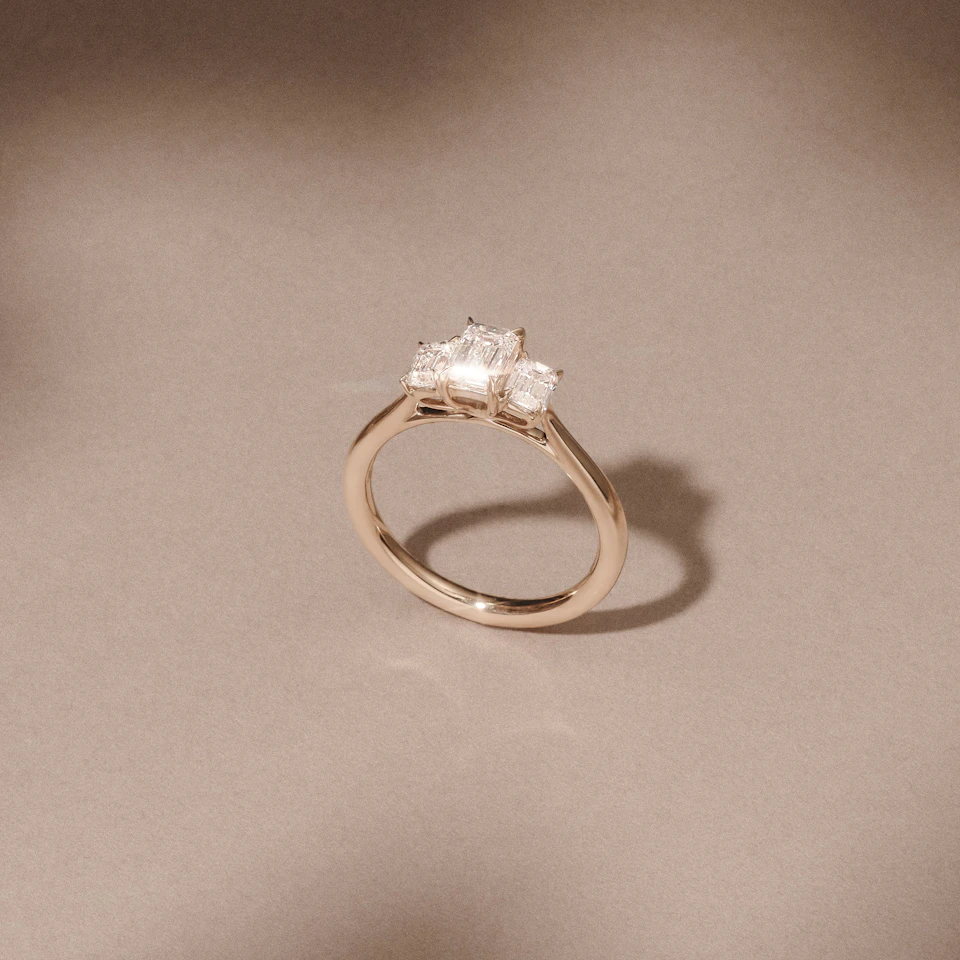 Evoke 1.00ct Emerald Cut Lab Diamond 3 Stone Ring in 9K Yellow Gold