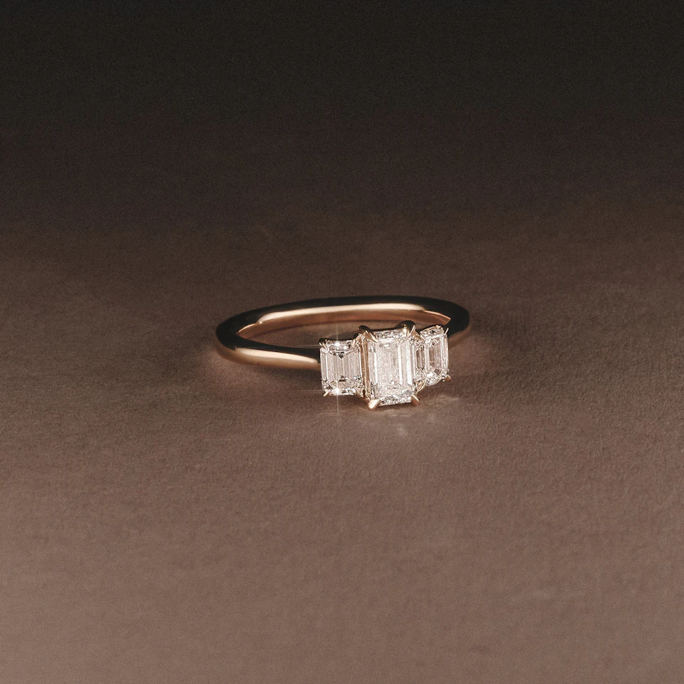 Evoke 1.00ct Emerald Cut Lab Diamond 3 Stone Ring in 9K Yellow Gold