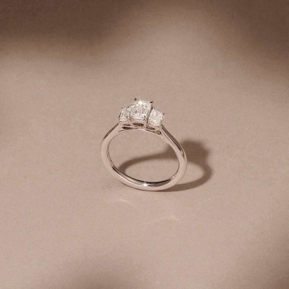 Evoke 1.00ct Emerald Cut Lab Diamond 3 Stone Ring in 9K White Gold