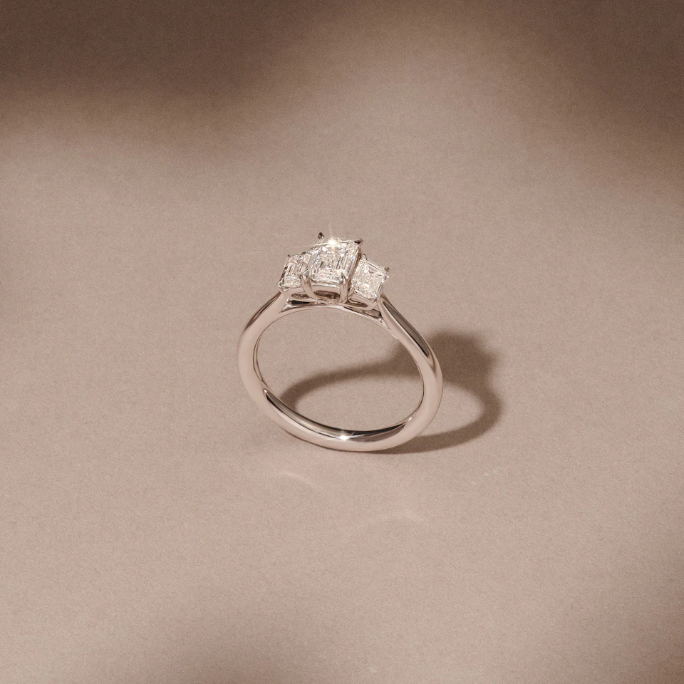 Evoke 1.00ct Emerald Cut Lab Diamond 3 Stone Ring in 9K White Gold