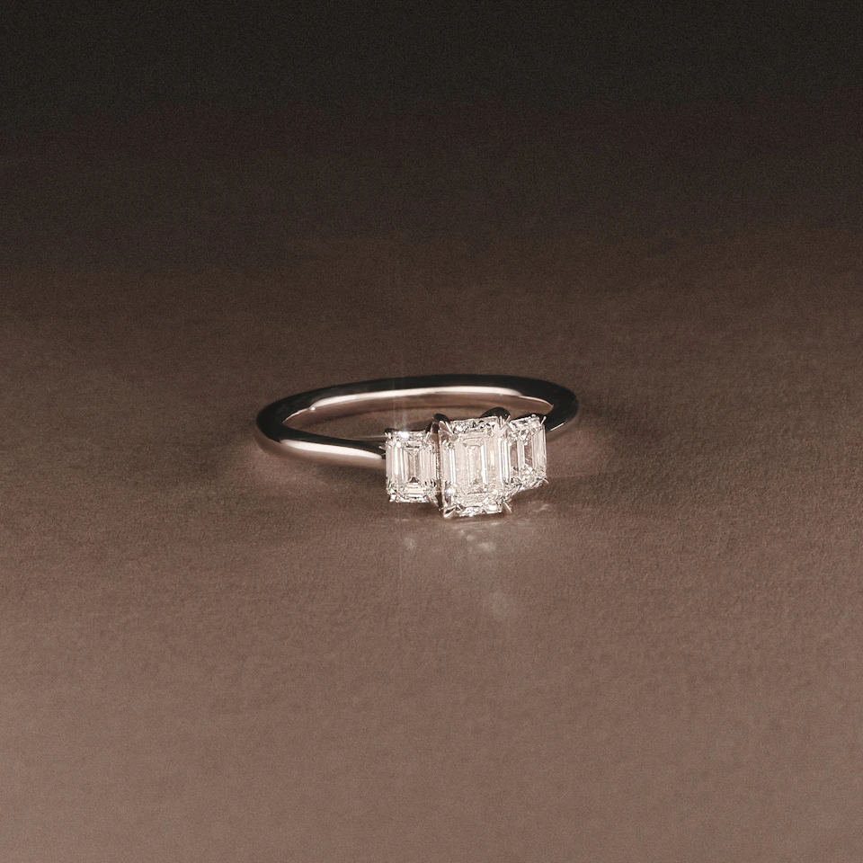 Evoke 1.00ct Emerald Cut Lab Diamond 3 Stone Ring in 9K White Gold