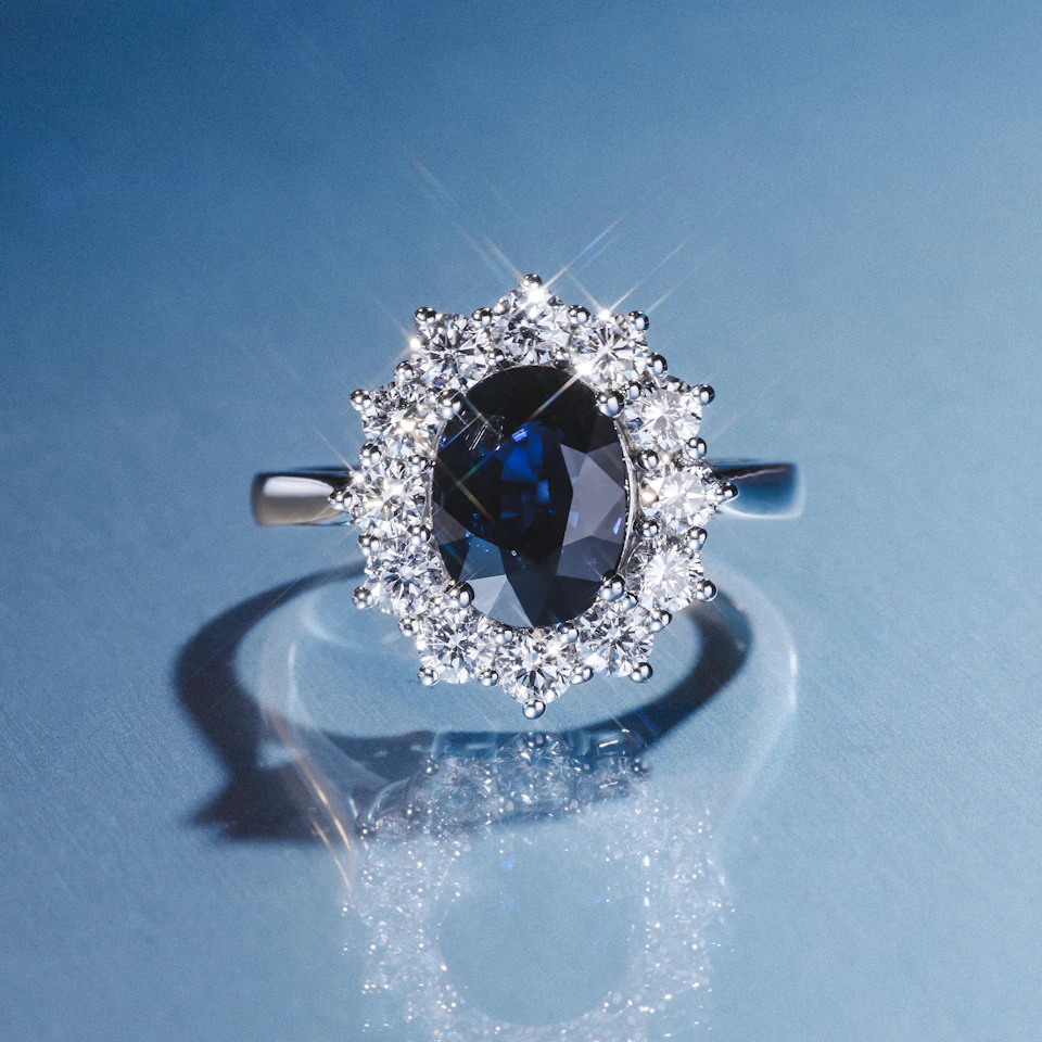 2.30ct Oval Cut Sapphire and Lab Diamond Halo Ring in 9K White Gold