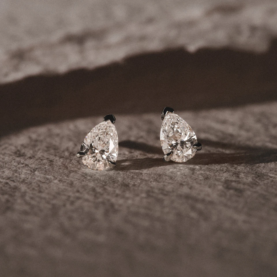 1.00ct Pear Cut Lab Diamond Stud Earrings in 18K White Gold