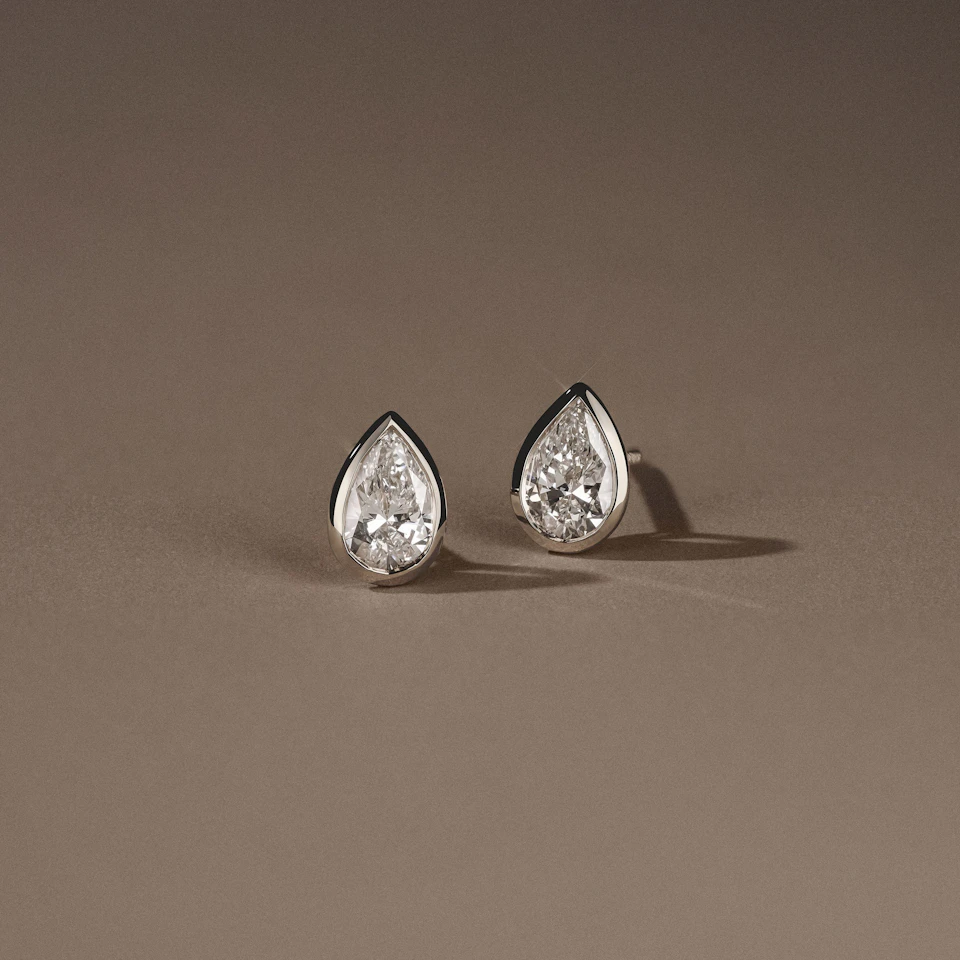 Bezel Set 1.00ct Pear Cut Lab Diamond Stud Earrings in Platinum