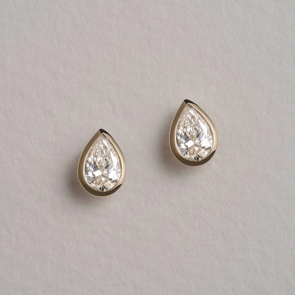 Bezel Set 1.00ct Pear Cut Lab Diamond Stud Earrings in 18K Yellow Gold