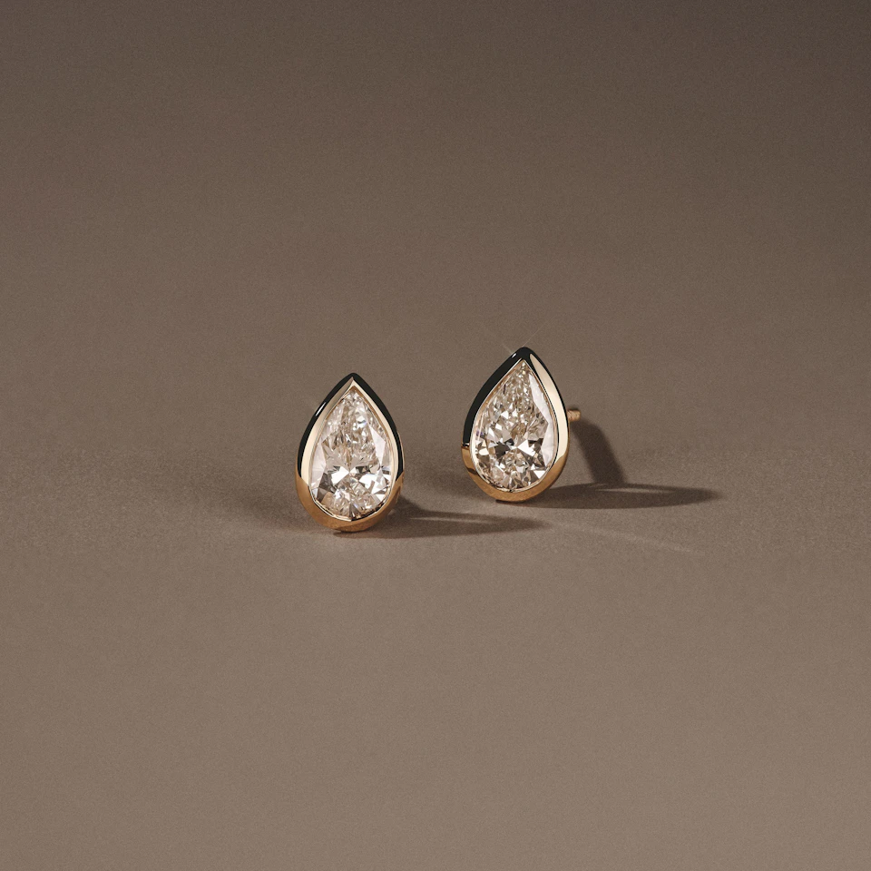 Bezel Set 1.00ct Pear Cut Lab Diamond Stud Earrings in 18K Yellow Gold