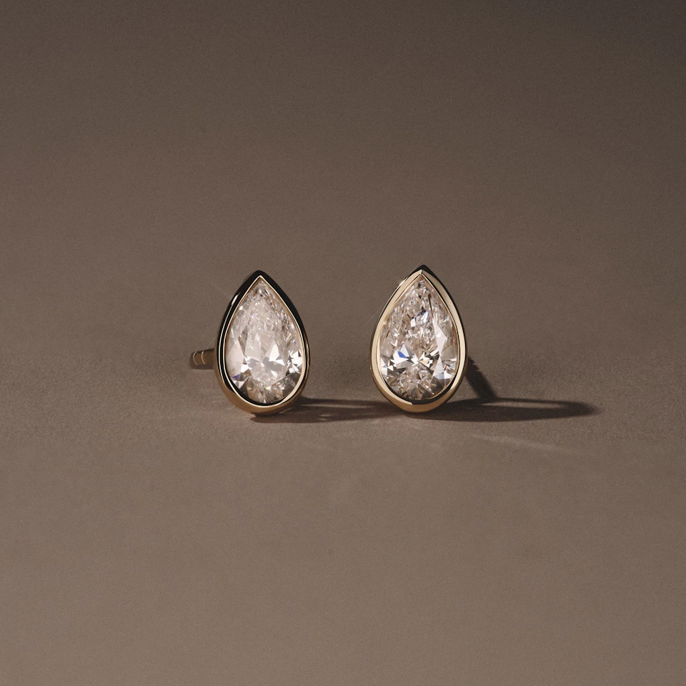 Bezel Set 2.00ct Pear Cut Lab Diamond Stud Earrings in 18K Yellow Gold