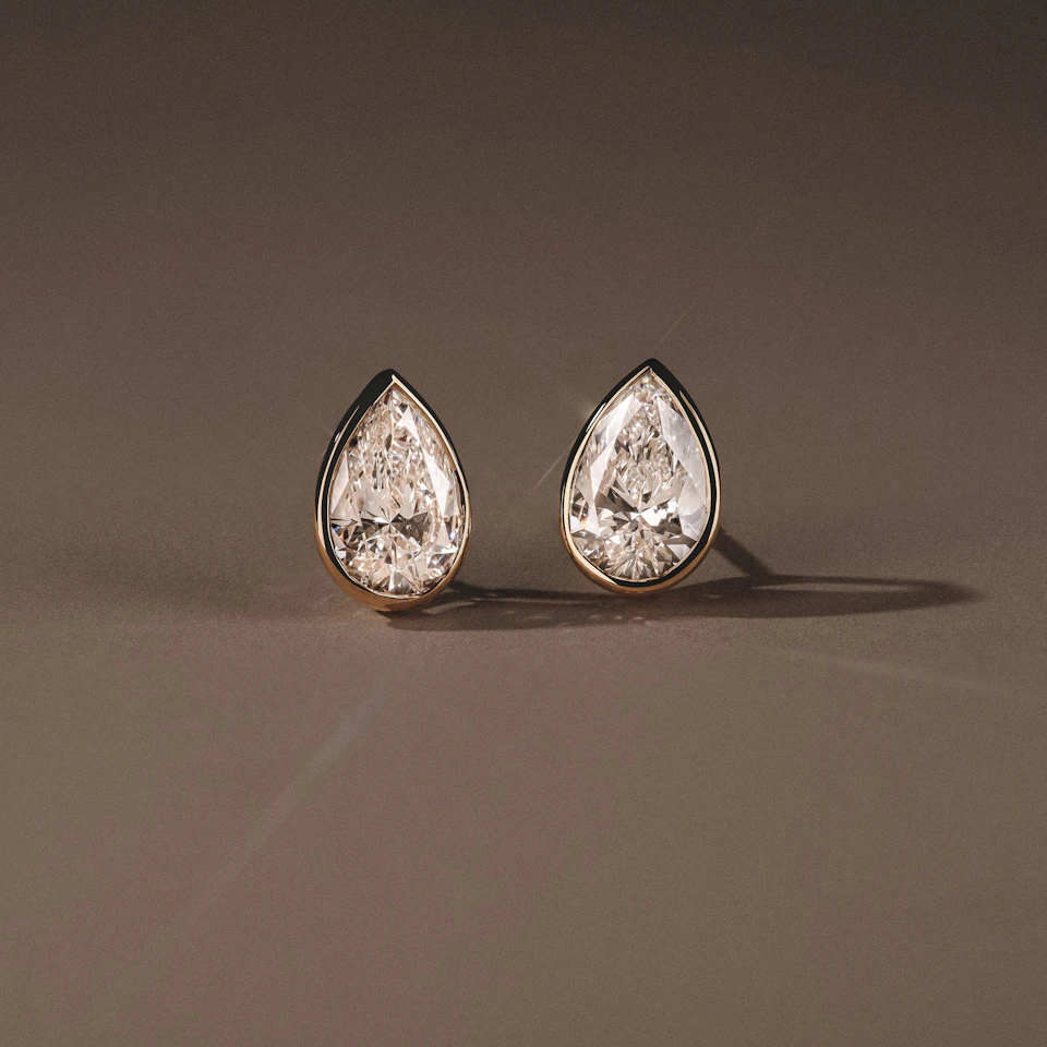 Bezel Set 3.00ct Pear Cut Lab Diamond Stud Earrings in 18K Yellow Gold