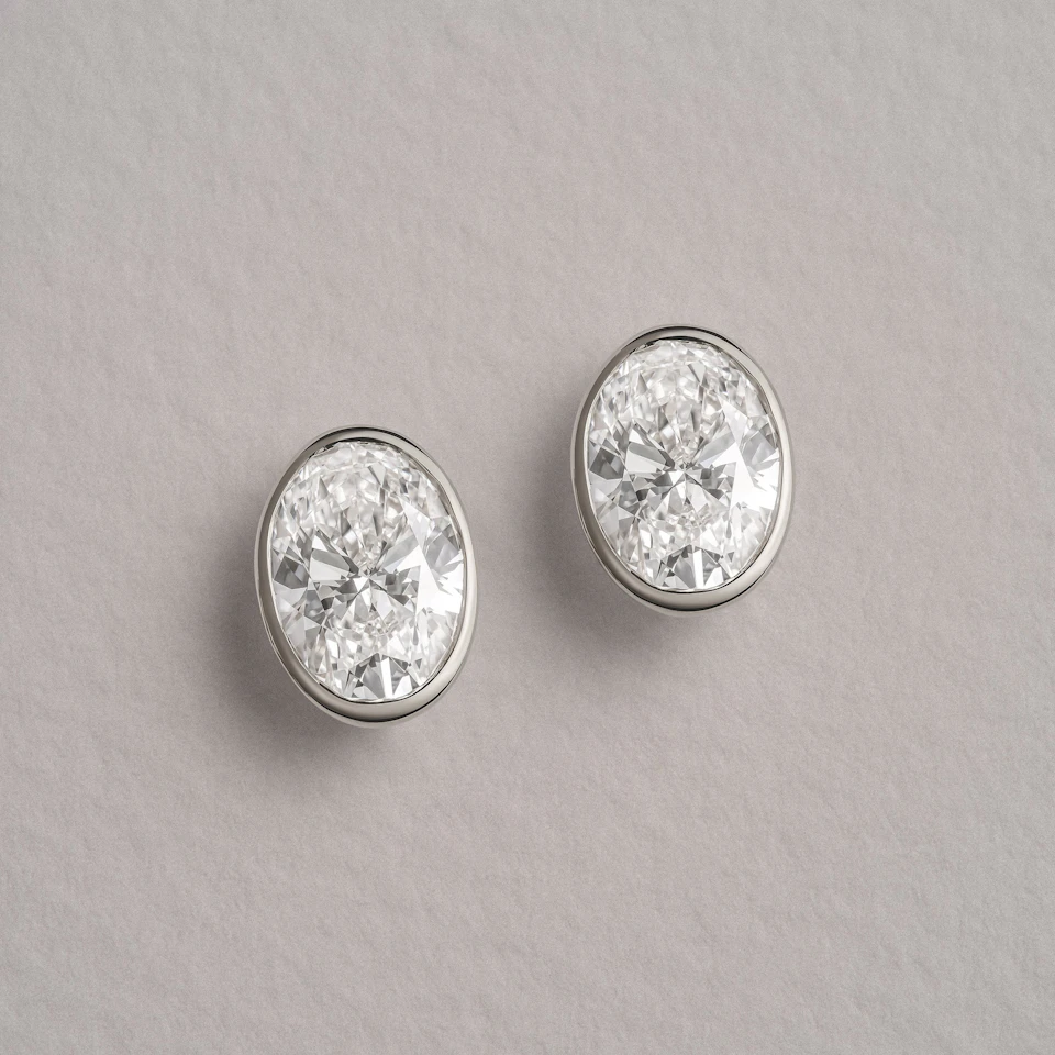 Bezel Set 3.00ct Oval Cut Lab Diamond Stud Earrings in 18K White Gold