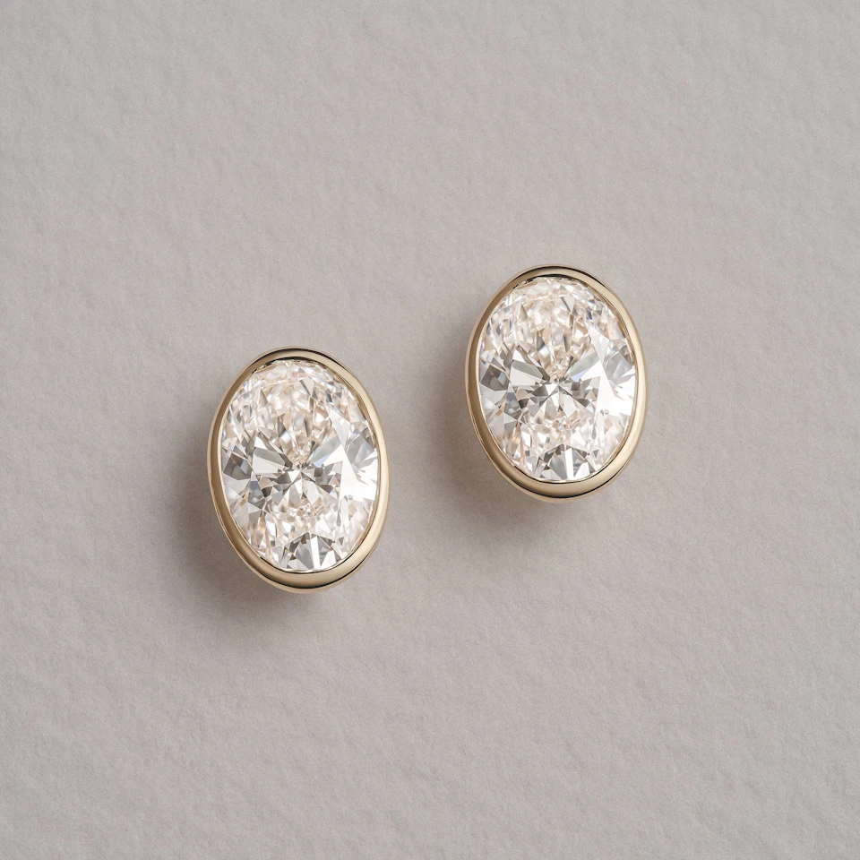 Bezel Set 3.00ct Oval Cut Lab Diamond Stud Earrings in 18K Yellow Gold