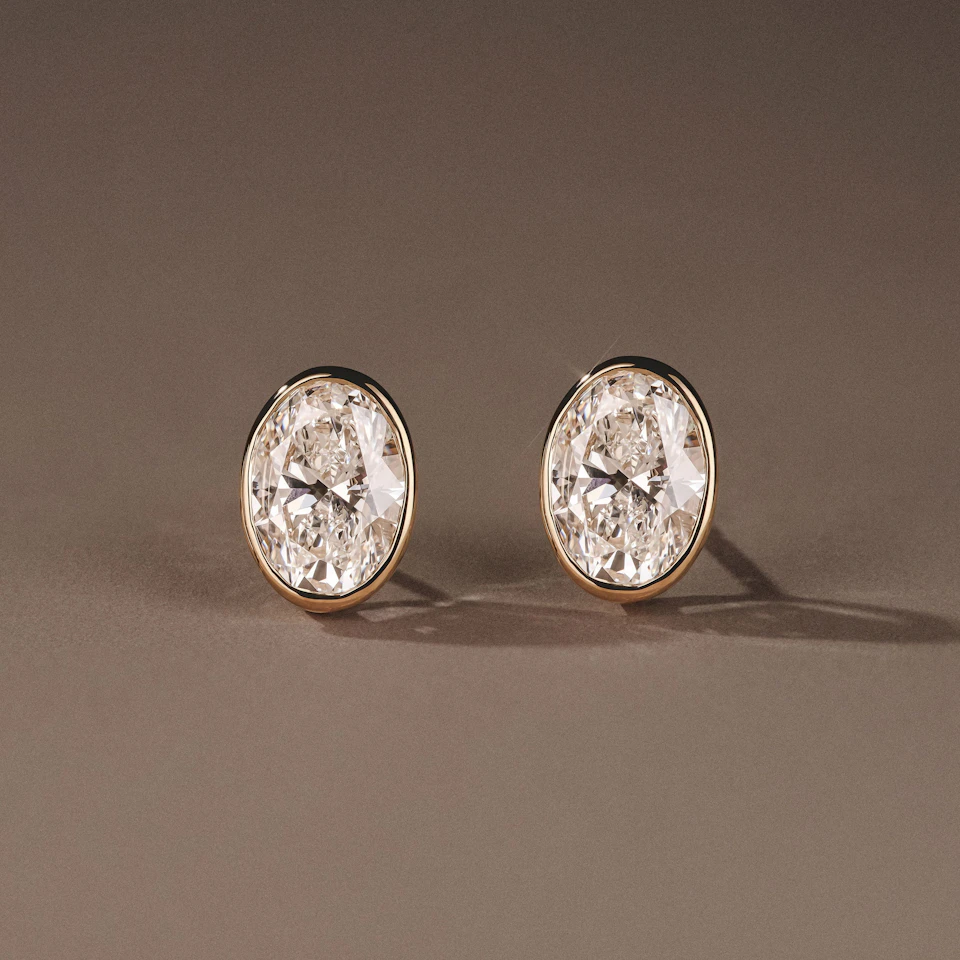 Bezel Set 3.00ct Oval Cut Lab Diamond Stud Earrings in 18K Yellow Gold