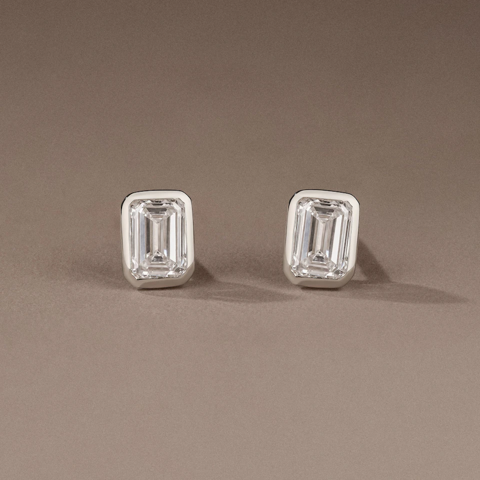 Bezel Set 1.00ct Emerald Cut Lab Diamond Stud Earrings in 18K White Gold