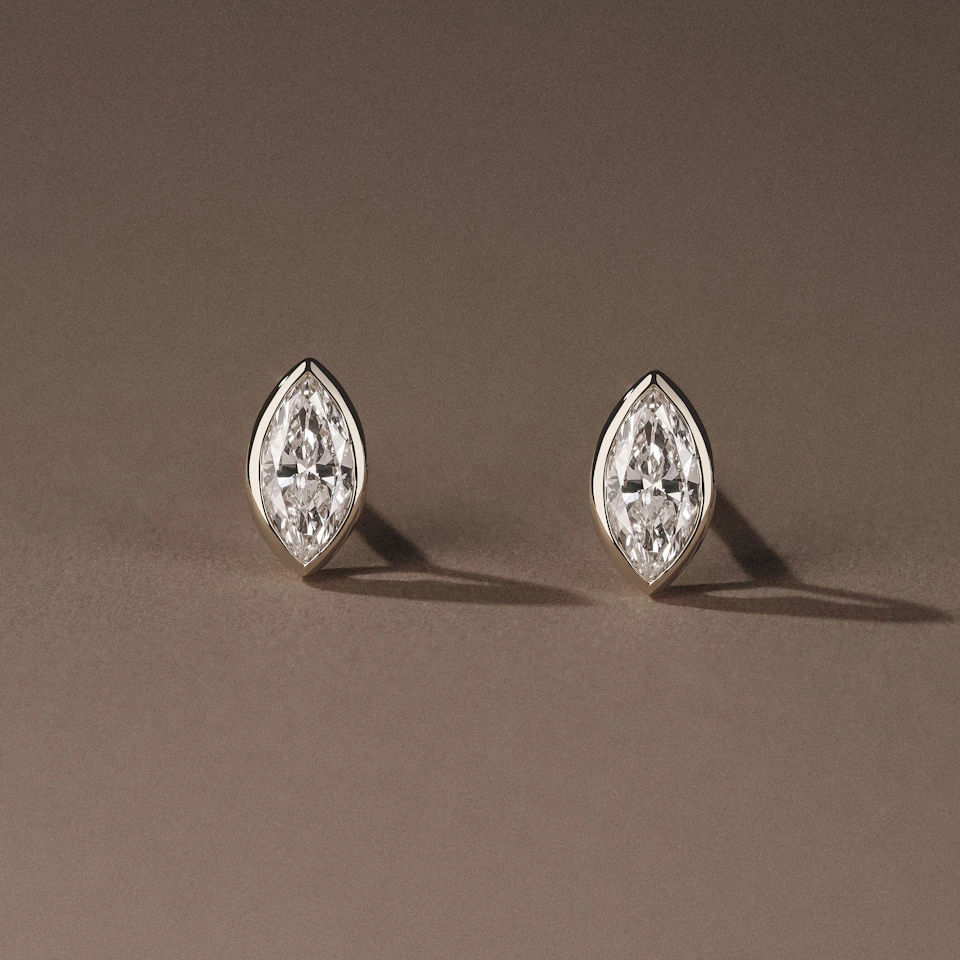 Bezel Set 0.50ct Marquise Cut Lab Diamond Stud Earrings in 18K White Gold