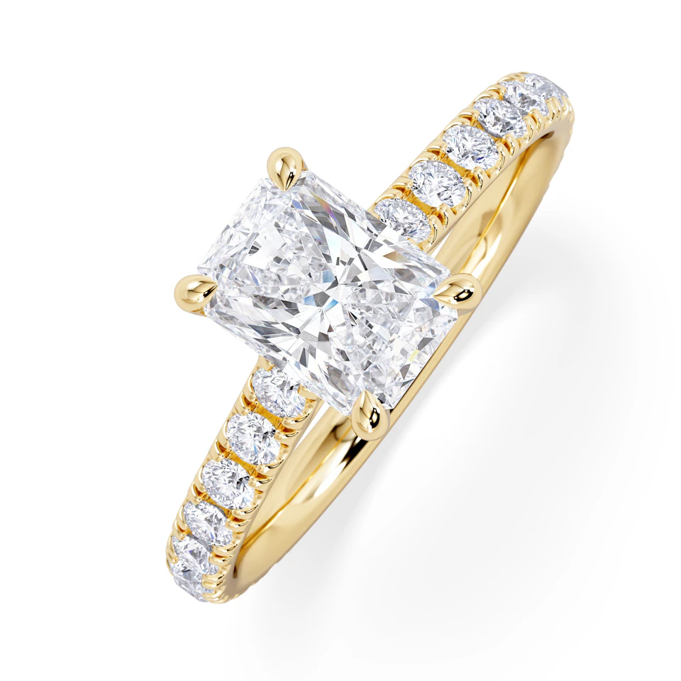 Amora Radiant 1.00ct Hidden Halo Diamond Engagement Ring With Side Stones Set in 18K Gold