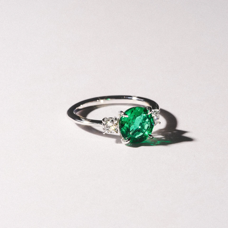Solene 2.00ct Round Cut Lab Emerald and Lab Diamond 3 Stone Engagement Ring in 18K White Gold