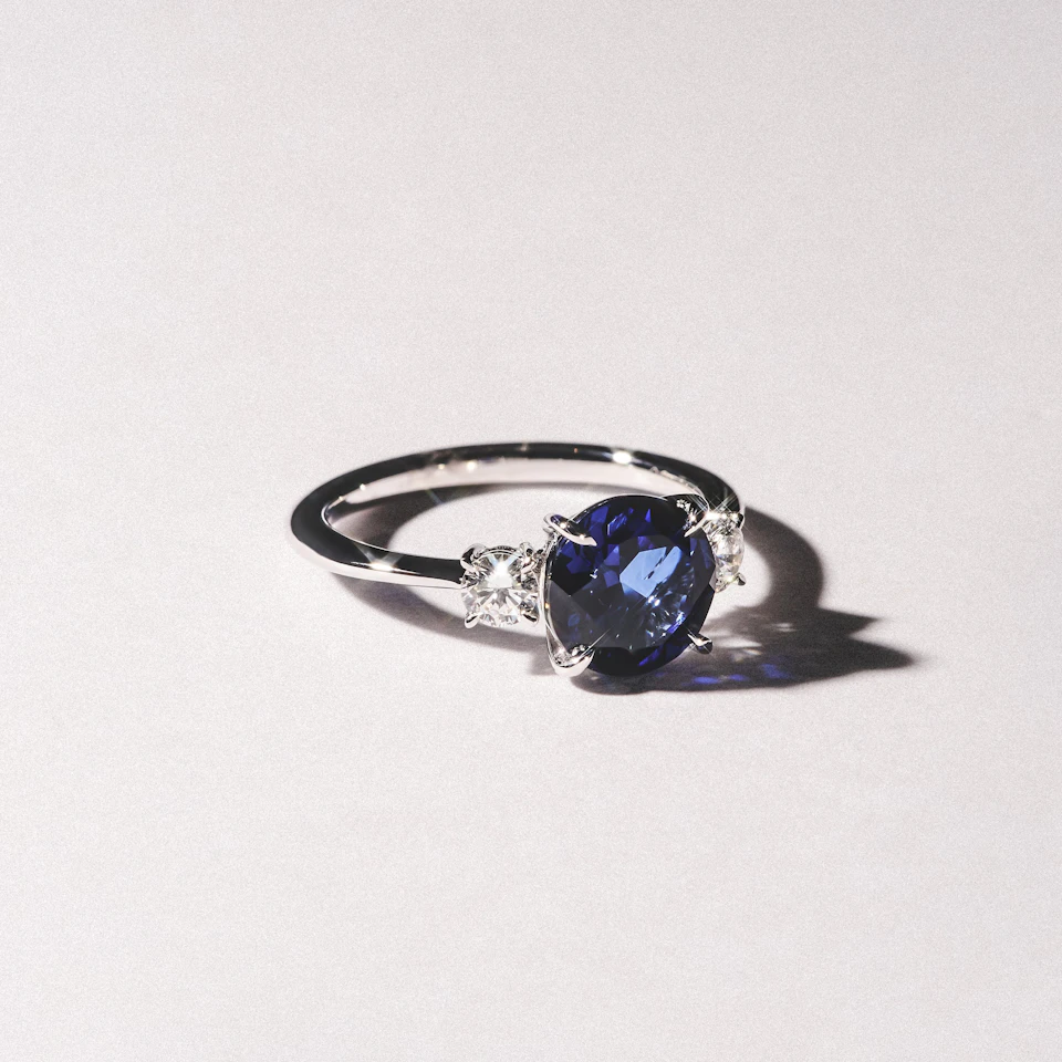 Solene 2.00ct Round Cut Lab Sapphire and Lab Diamond 3 Stone Engagement Ring in 18K White Gold