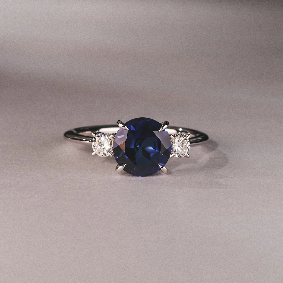 Solene 2.00ct Round Cut Lab Sapphire and Lab Diamond 3 Stone Engagement Ring in 18K White Gold