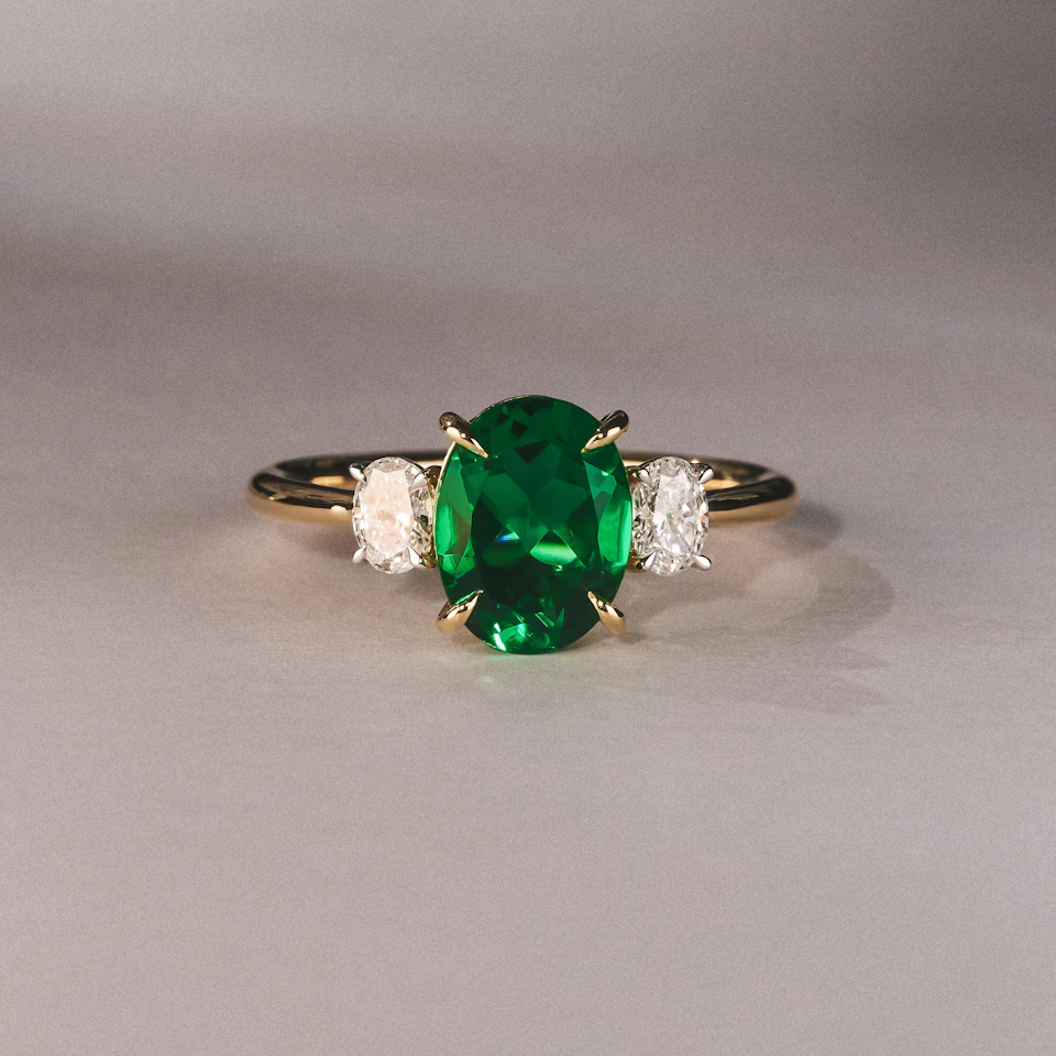 Solene 2.00ct Oval Lab Emerald and Lab Diamond 3 Stone Engagement Ring in 18K Yellow Gold