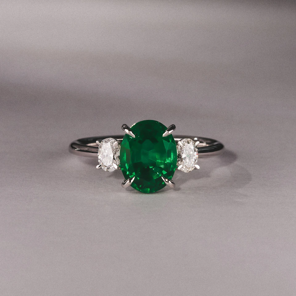 Solene 2.00ct Oval Cut Lab Emerald and Lab Diamond 3 Stone Engagement Ring in 18K White Gold