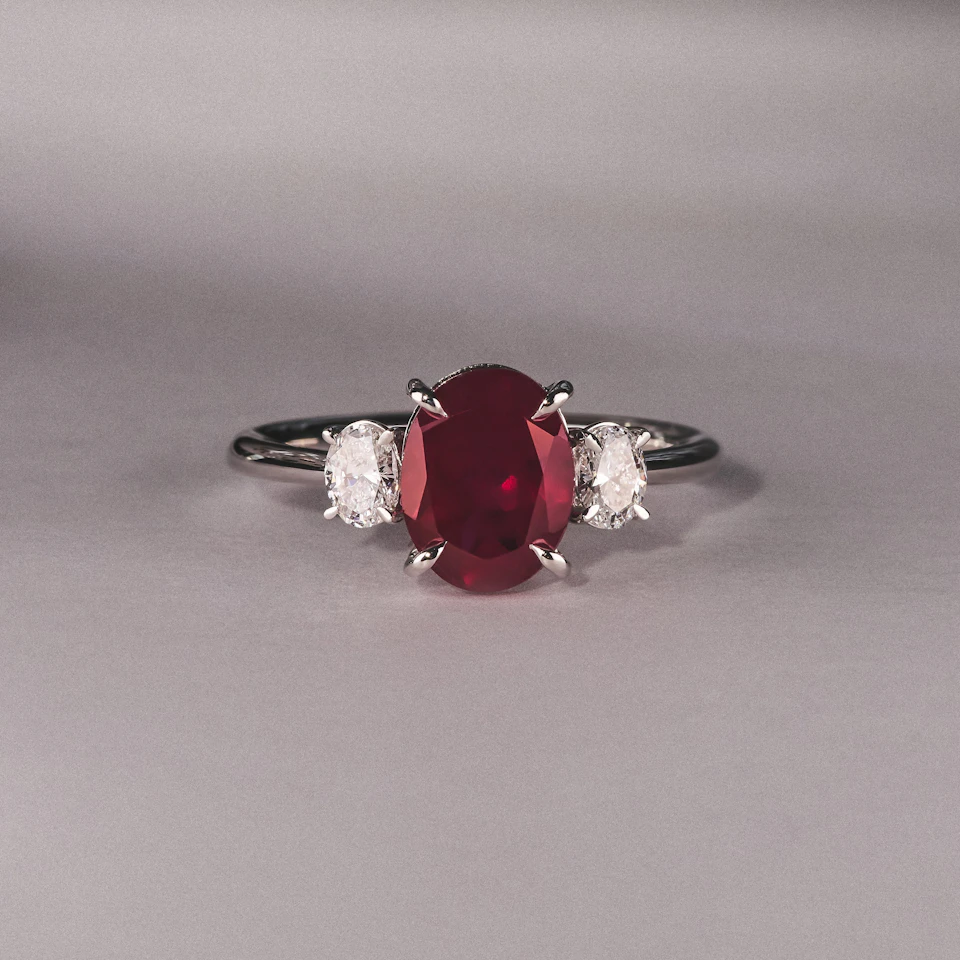 Solene 2.00ct Oval Cut Lab Ruby and Lab Diamond 3 Stone Engagement Ring in 18K White Gold