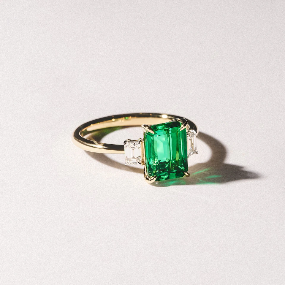 Solene 2.50ct Emerald Cut Lab Emerald and Lab Diamond 3 Stone Engagement Ring in 18K Yellow Gold