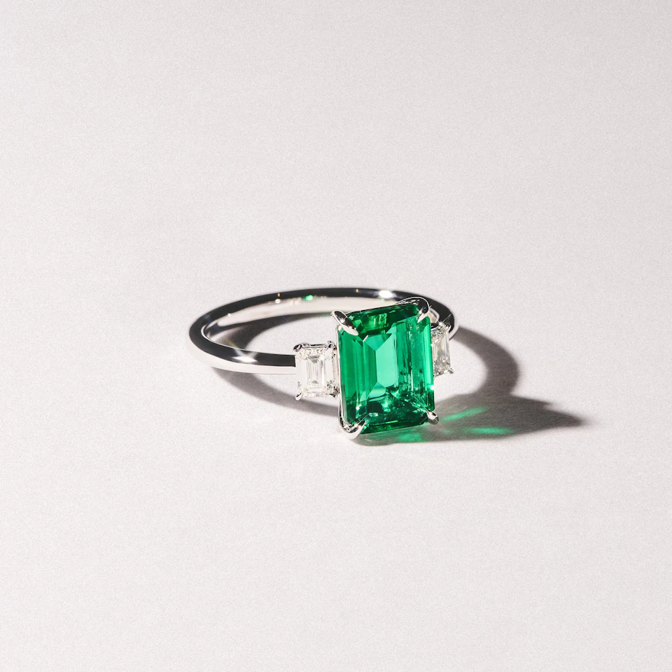 Solene 2.50ct Emerald Cut Lab Emerald and Lab Diamond 3 Stone Engagement Ring in 18K White Gold