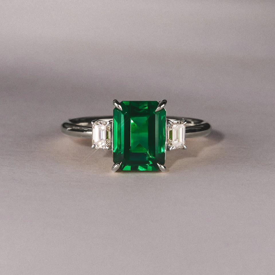Solene 2.50ct Emerald Cut Lab Emerald and Lab Diamond 3 Stone Engagement Ring in 18K White Gold