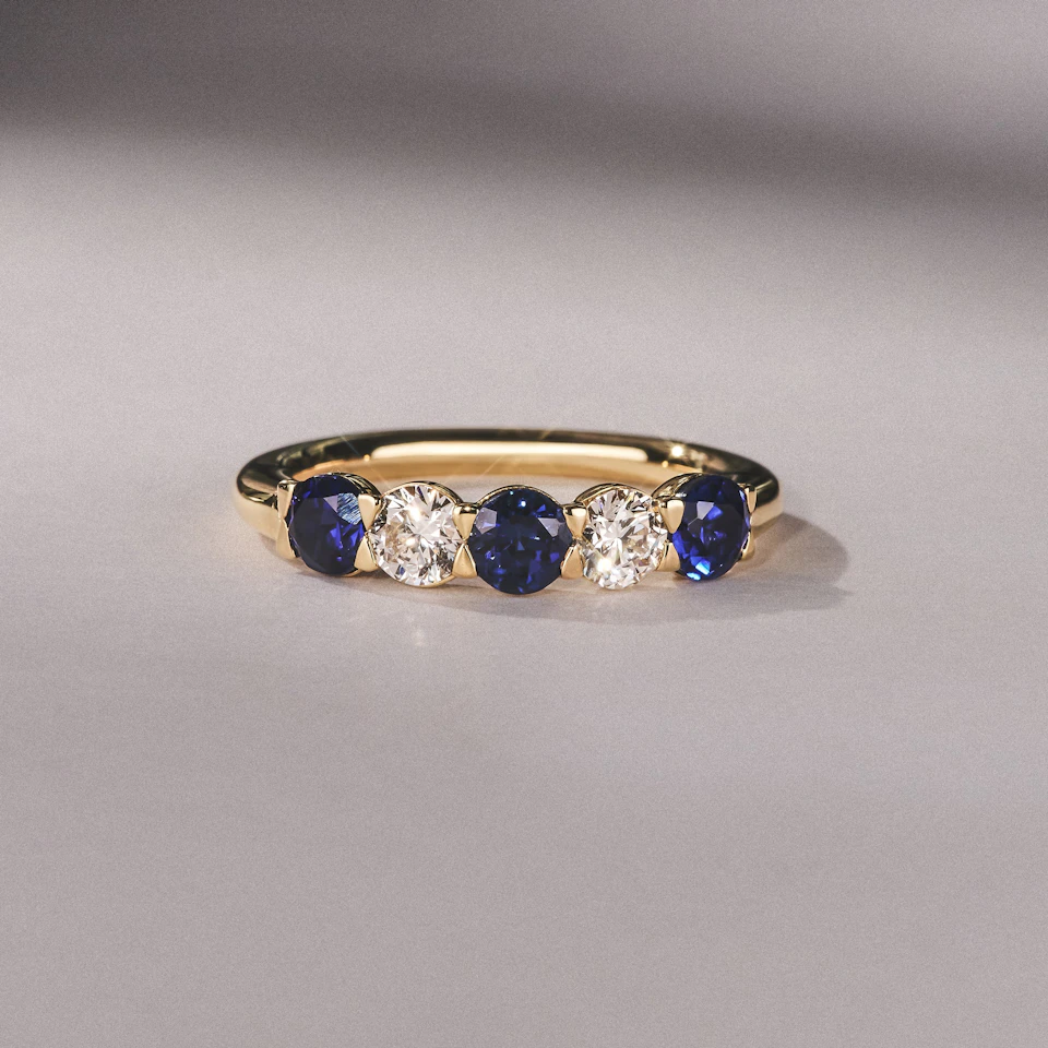 Solene 0.75ct Round Cut Lab Sapphire and Lab Diamond Half Eternity Ring in 18K Yellow Gold