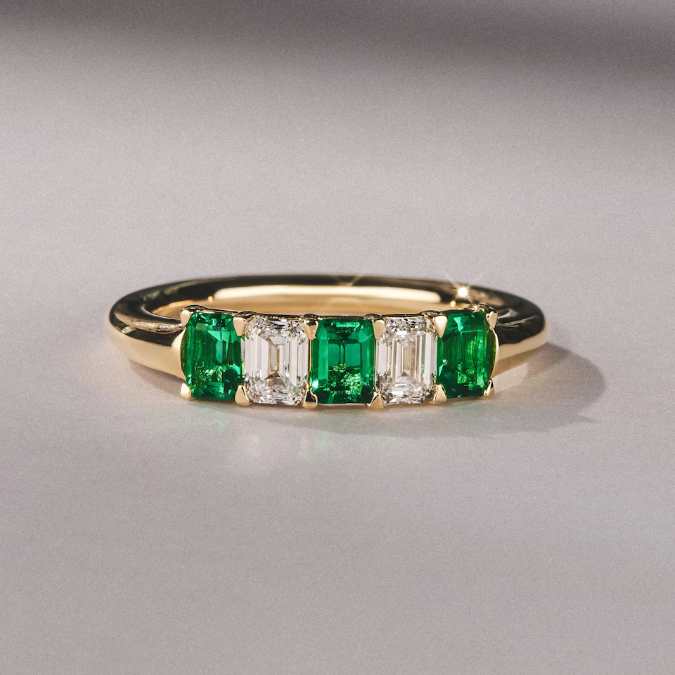 Solene 0.75ct Emerald Cut Lab Emerald and Lab Diamond Half Eternity Ring in 18K Yellow Gold