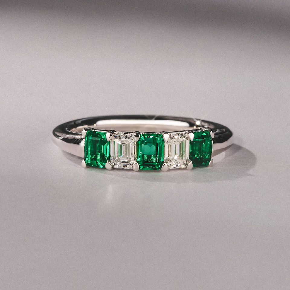 Solene 0.75ct Emerald Cut Lab Emerald and  Lab Diamond Half Eternity Ring in 18K White Gold
